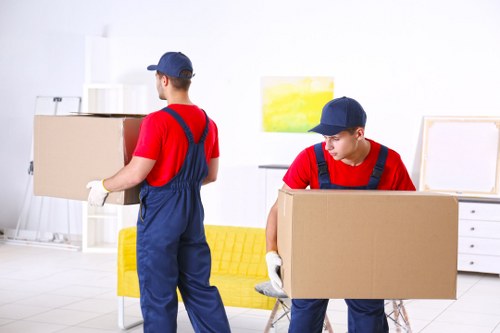 Moving van and packed boxes for house removals in Haringey