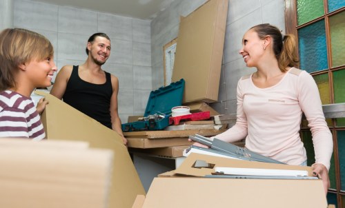 Unpacking boxes in a new home after house removals in Haringey