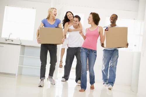 Student removals van loading boxes in Haringey