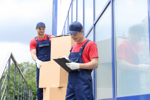 Man with a van loading boxes for a move in Haringey