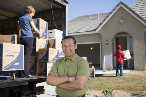 Local Haringey moving team loading household items carefully
