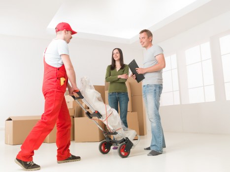 Moving team coordinating safely in a residential property