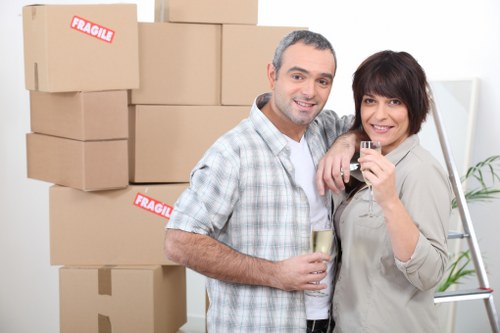 Professional movers handling furniture during a same day move in Haringey